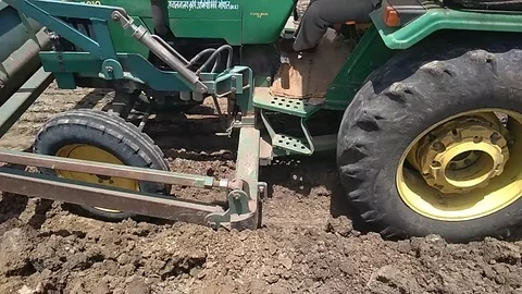 Tractor Plowing Stock Footage 117928601