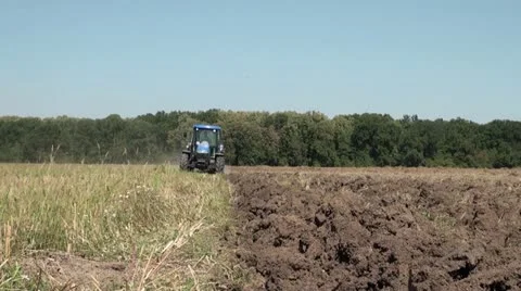 Tractor plowing, front view 스톡 동영상 12153717
