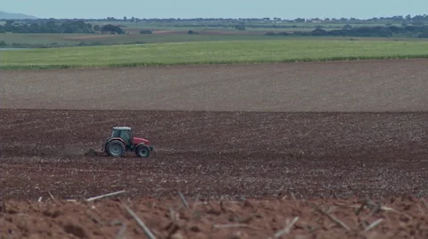 Tractor plowing the land 1 Stock Footage 51942566