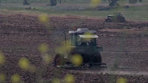 Tractor plowing the land 3 Stock Footage 51952485