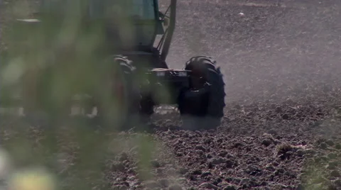 Tractor plowing the land 4 Stock Footage 51942897