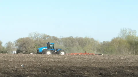 Tractor plowing long shot V1-0004 Stock Footage 52520967