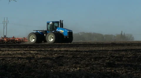 Tractor plowing pass Stock Footage 52528967