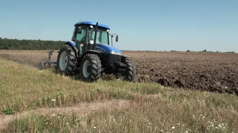 Tractor plowing, side view 스톡 동영상 12153711