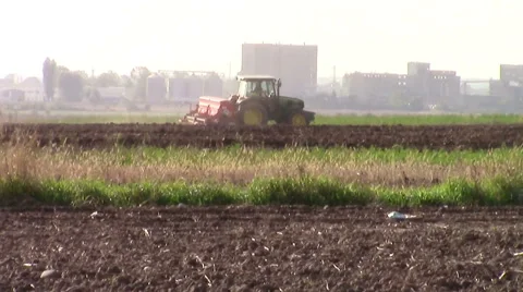 Tractor plowing soil in autumn Stock-Footage 56340084