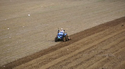 Tractor plowing the spring field (05) Stock Footage 23689999