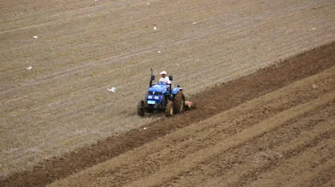 Tractor plowing the spring field (06) Stock Footage 23691676