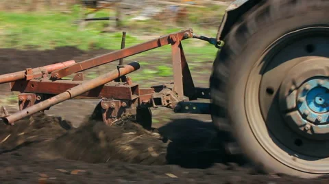 Tractor plowing at spring Stock Footage 5186458
