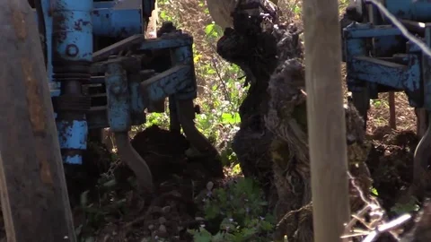 Tractor plowing the vines Stock Footage 83873760