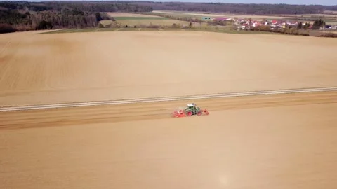 Tractor plows the field Stock Footage 172377988