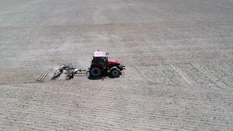 Tractor plows the field Stock Footage 270384090