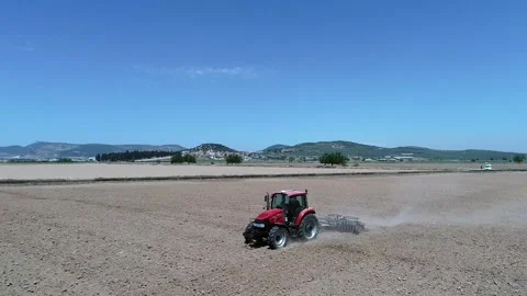 Tractor plows the field Stock Footage 270384103