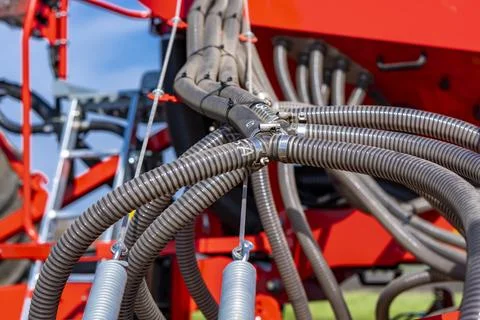 Tractor plows the field. Stock Photos