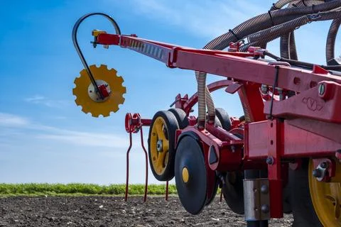 Tractor plows the field. Stock Photos