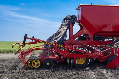 Tractor plows the field. Stock Photos