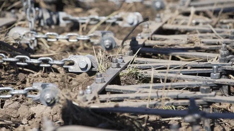 Tractor plows field with plows before sowing. Agricultural machinery on plowing Stock Footage 106248164