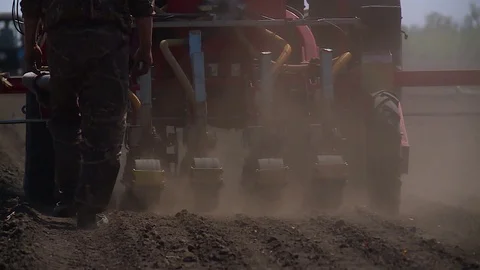 Tractor plows a field for seedlings Stock-Footage 123045758