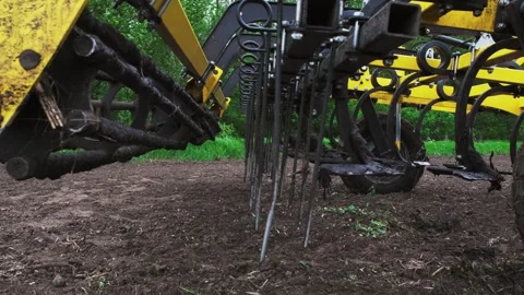 A tractor plows a field in the spring. Stock Footage 274159875