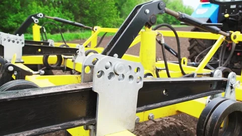 A tractor plows a field in the spring. Stock Footage 274160758