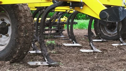A tractor plows a field in the spring. Stock Footage 274161286