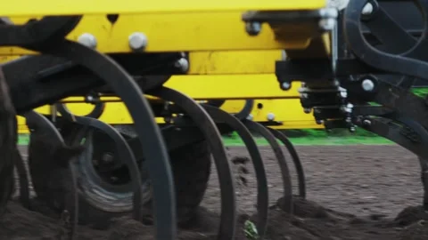 A tractor plows a field in the spring. Stock Footage 274162049
