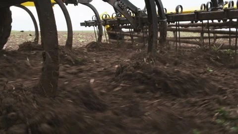 A tractor plows a field in the spring. Stock Footage 274163304