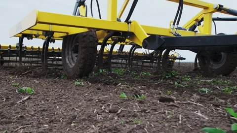 A tractor plows a field in the spring. Stock Footage 274163661