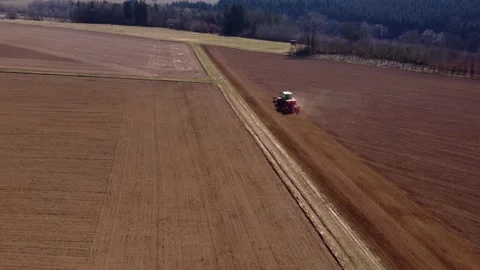 Tractor plows the fields Stock Footage 172377283