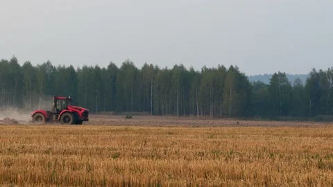 Tractor Plows The Ground In The Field Stock Footage 217381869