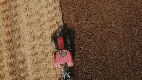 Tractor plows the ground Stock Footage 114248147