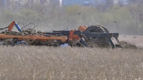The tractor plows the ground. Stock Footage 153831099
