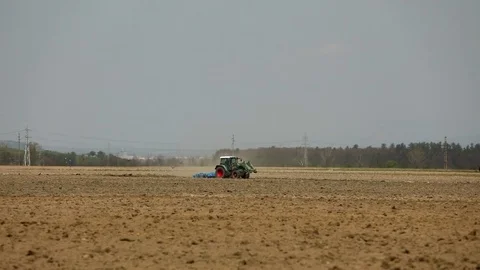 The tractor that plows the land Romania Stock Footage 84602585