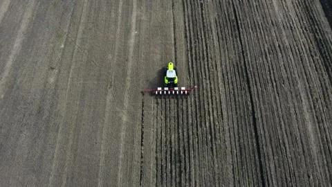 The tractor plows the land for sowing Video stock 209929066
