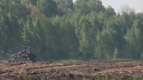 Tractor plows virgin soil Stock Footage 108164830
