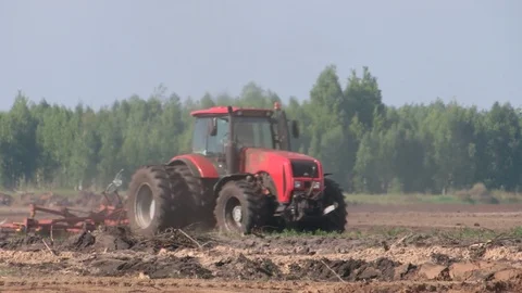 Tractor plows virgin soil Stock Footage 108165276
