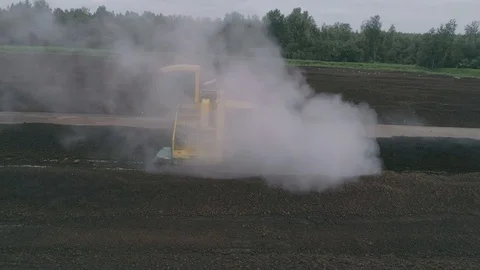 Tractor processes a field Stock Footage 100510439