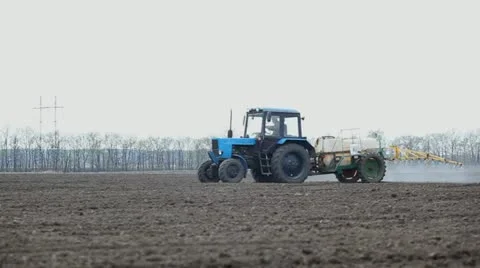 Tractor processing a field Stock-Footage 11007812
