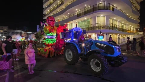 Tractor-Pulled Carnival Float at Malta Summer Carnival 2024. Stock Footage 303573160
