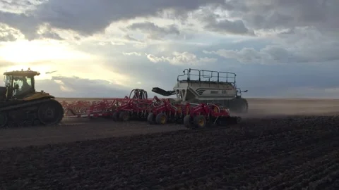 Tractor pulling Air Seeding Drill Stock Footage 263036311