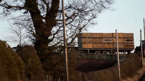 Tractor pulling trailer Stock Footage 21904060