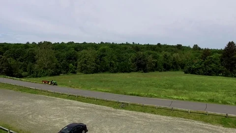 Tractor Pulls Away Video stock 78210769