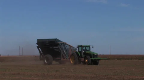 Tractor pulls peanut trailer Stock Footage 32286525