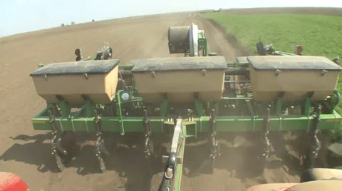 Tractor pulls the seeder Stock Footage 39672713