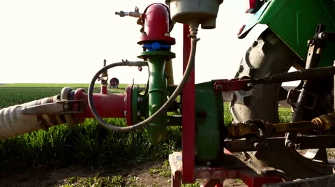 Tractor pump for field irrigation. Stock Footage 66555871