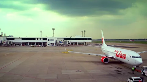 Tractor Pushes Back Thai Lion Airliner at International Airport in Bangkok Stock Footage 53551803