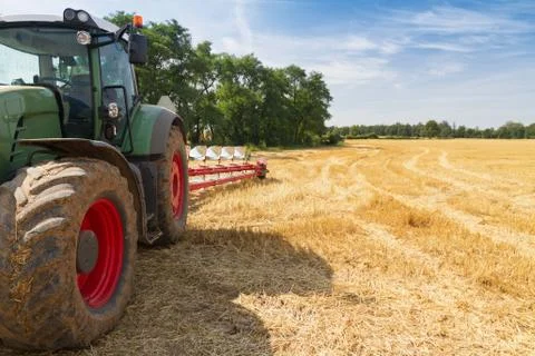 Tractor ready to plow stubble fields Stock Photos