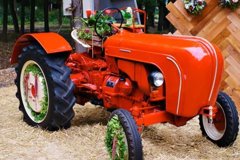 Tractor red decorative Stock Photos