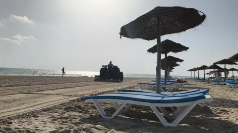 Tractor Removing Sand and Debris from Beach in Djerba Stock-Footage 342230223