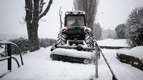 Tractor Removing Snow With Plow. Snowblower Removes Snow From the Walkway With 動画素材 71438068