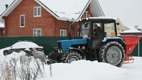 Tractor removing snow from the road 스톡 동영상 156545571